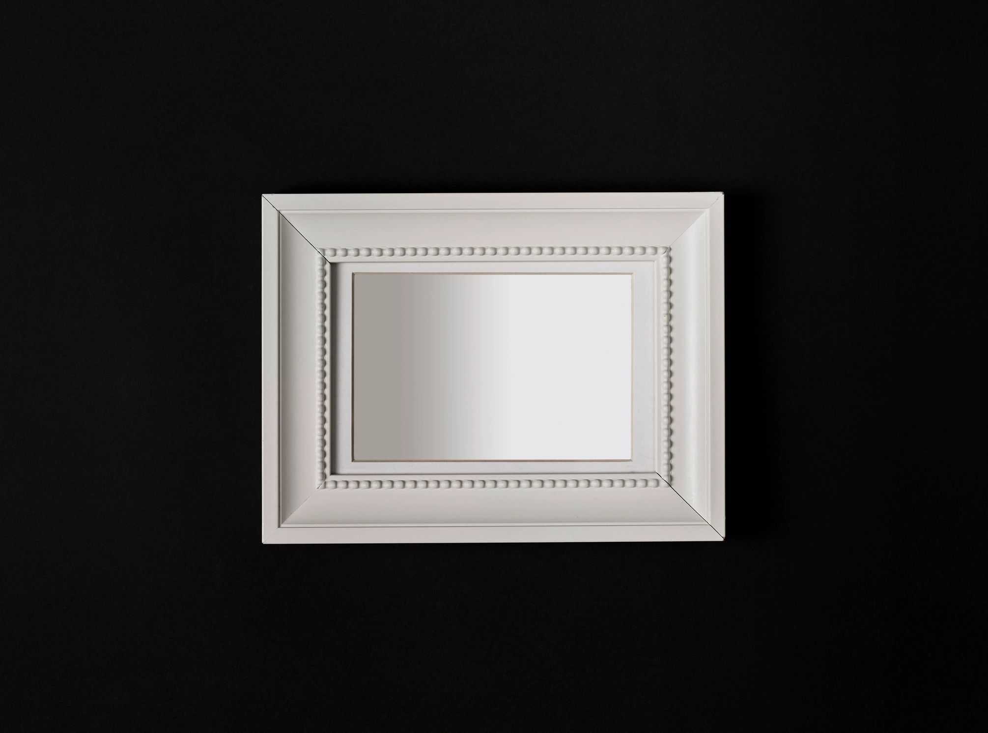 Framed photo display representing add-on framing service