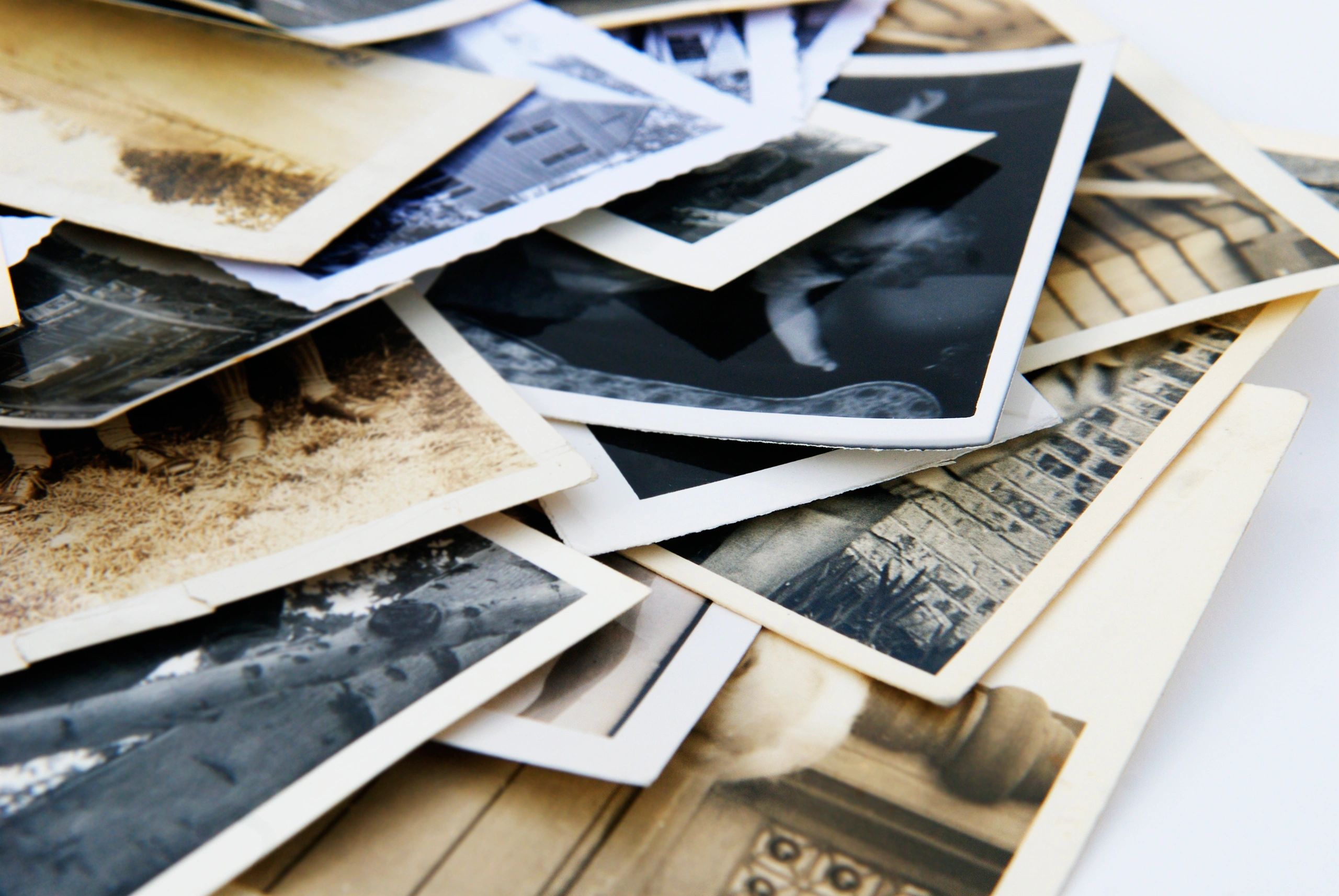 Vintage photographs gathered together for restoration and preservation
