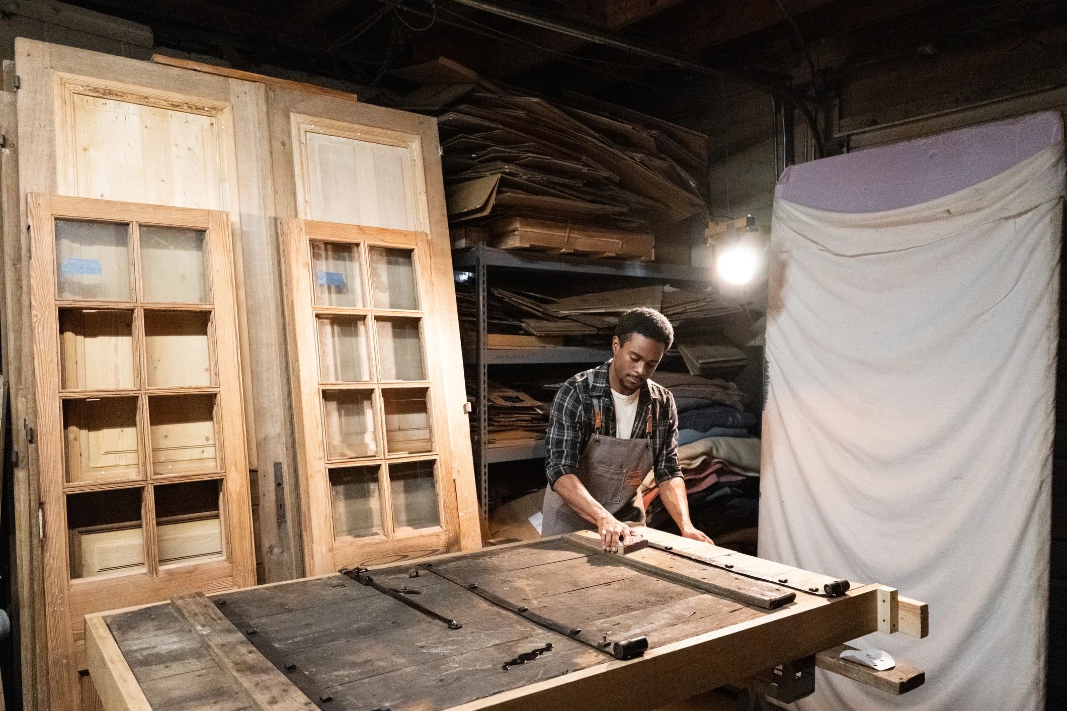Hands restoring a treasured item in a workshop